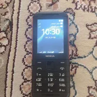 گوشی نوکیا ساده و تبلت نو.