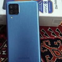 ی عدد گوشی m12 درحد صفر