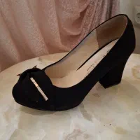 کفش مجلسی|کیف، کفش، کمربند|ری, دیلمان|دیوار