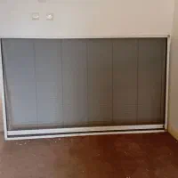 در کشویی(در پلیسه ای)