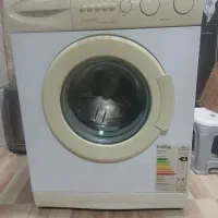 لباسشویی کنوود ب شرط سلامت|ماشین لباسشویی و خشک‌کن لباس|رشت, استقامت ۱|دیوار