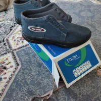 کفش کار|کیف، کفش، کمربند|مهاجران, |دیوار