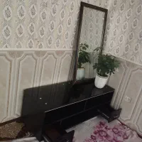 آینه و زیر تلویزیون