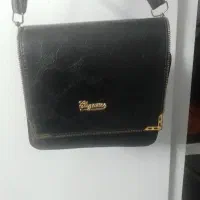 کیف‌زنانه‌وکوله‌پشتی‌با محافظ‌لبتاب‌کارکرده