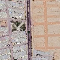 زمین درب حیاط کنارستان