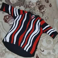 تعدادی شومیز زنانه|لباس|ساری, |دیوار