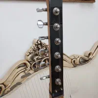 ساز قوپوز برقی|سازهای سنتی|مشگین شهر, |دیوار