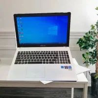 لپ تاپ ایسوس سفید در حد آکبند واقعی