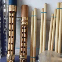 سازنده و نوازنده نی انبان.|سازهای بادی|شهرکرد, |دیوار