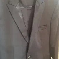 کت و شلوار مشکی مردانه.