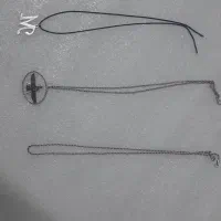 ۳ عدد گردنبند و ۹ عدد سکه سال ۵۷ و ۵۸