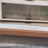 هود کم ‌کارکرد با کابینت دکوری بالای هود