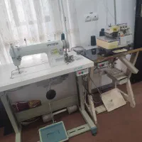 سردوز و چرخ خیاطی