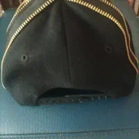 کلاه کپ|لباس|کرج, کوی گلها|دیوار