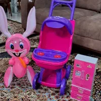 کالسکه و یخچال و بادکنک اسباب بازی