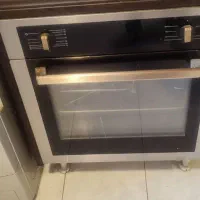 اجاق فر توکارکابینتی گازی وبرقی ترکیه باتوجه گردان