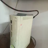 ایکس باکس دو دسته همراه یک بازی فوتبال