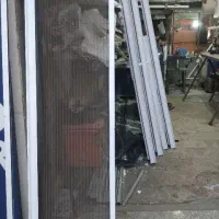 تولیدی درب و پنجره توری پلیسه ای کشویی(قیمت عمده)