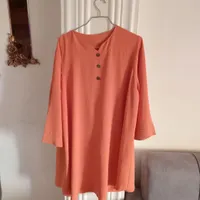 مانتو نارنجی آستین بلند تا سایز ۵۸ به تن میخوره