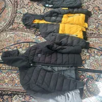 سه عدد کاپشن مردانه و یک پالتو زنانه