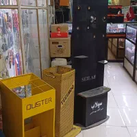 استند فروشگاهی لوازم نظافتی جارو و استند شیرآلات..