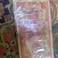 پول قدیمی شاه رضا شاه با کلاه پهلوی