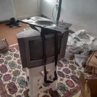 تلویزیون ۱۴ با پایه دیواری وکپسول ورادیات پراید