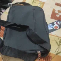 یک عدد کیف اداری بزرگ و کوچک