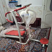 یک دستگاه تردمیل و آبگرمکن یخچالی