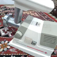 چرخ گوشت و اب میوه گیر