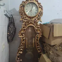 ساعت ایستاده طلایی و اینه طاووس طلایی