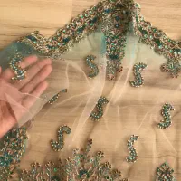 دو عدد پارچه یکی تور یکی ساتن