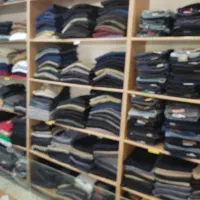 حدود۱۳مربع متر قفسه ،Mdf و دوعدد میز پیشخان