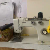 چرخ خیاطی و قیچی