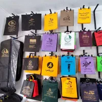 ساک دستی پارچه ای تبلیغاتی و بگ سوزنی با چاپ