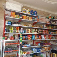 ی ردیف نصفی قفسه نو به همراه استندهای چیپس پفک