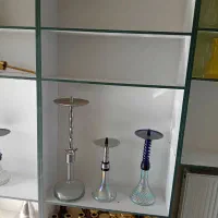قفسه شلف کتاب و وسایل تزئینی