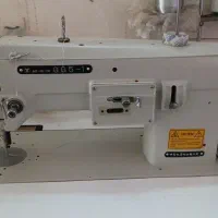 فروشنده و خریدار چرخ گلدوزی