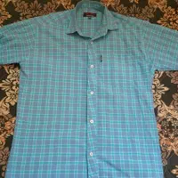 یک عدد پیراهن مردانه ویک عدد شلوار لی اسلش