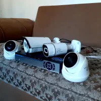 دستگاه AHD چهار کاناله . چهار عدد دوربین 2 . هارد