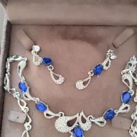 ست گوشواره و گردنبند استیل . انگشتر سنگ بنفش