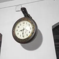 ساعت دو طرفه در حد نو به ضمانت کار