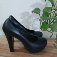 کفش مجلسی|کیف، کفش، کمربند|قم, مسجد امام حسن|دیوار