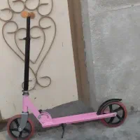 اسکوتر صورتی