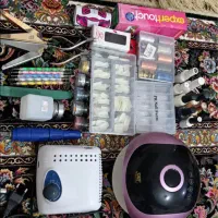 وسایل کاشت ناخن در حد نو یک ماه کار (کازرون )
