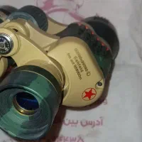 دوربین شکاری روسی و تبر کوهنوردی