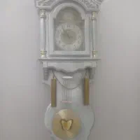 ساعت دیواری نقره ای