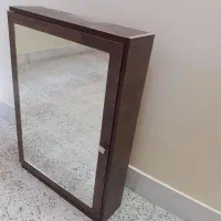 آینه دیواری  همراه با قفسه