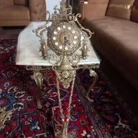 ساعت برنجی سنگین وزن
