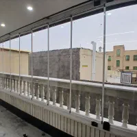 شیشه تاشو بالکنی وتراس شیشه ای تاشو کرکره برقی